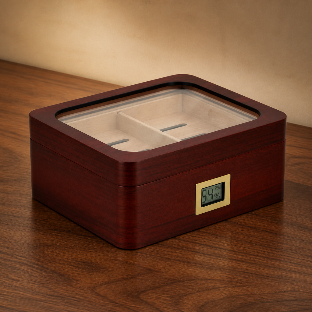 Walnut glass-top cigar humidor with digital hygrometer on warm wood table
