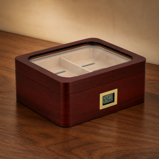 Walnut glass-top cigar humidor with digital hygrometer on warm wood table